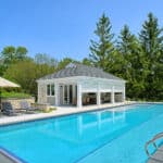 storm window partially closed on inverness pool house